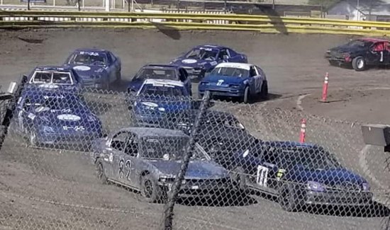 Greg Baronian (No. 11) and Randy Brown (No. 82) lead the Central Valley Mini Stock Main Event on Sunday.